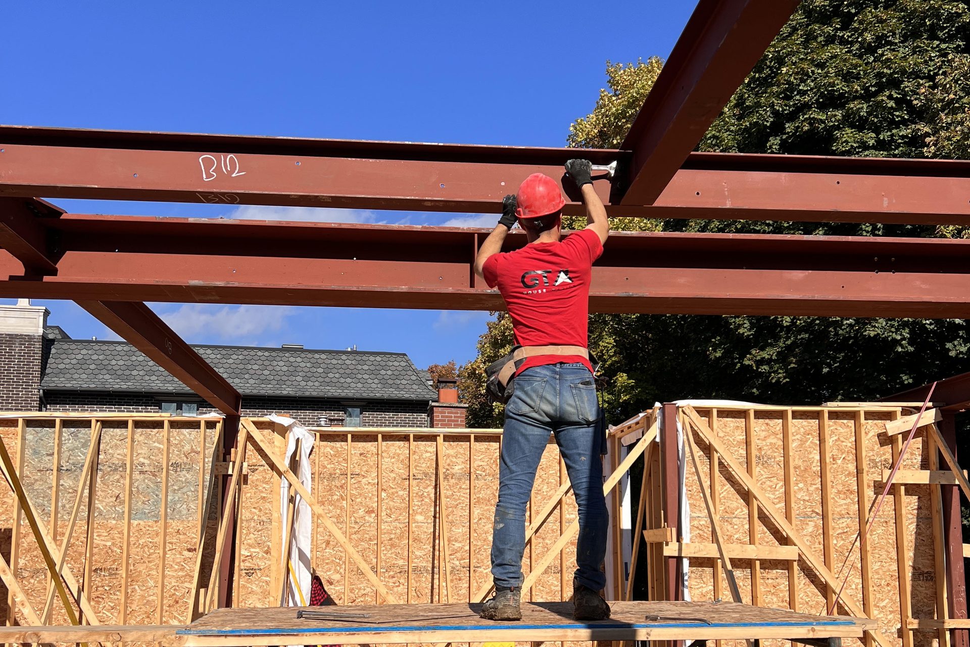 Steel beam installation after load-bearing wall removal in Toronto